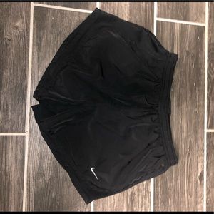 Solid black Nike shorts